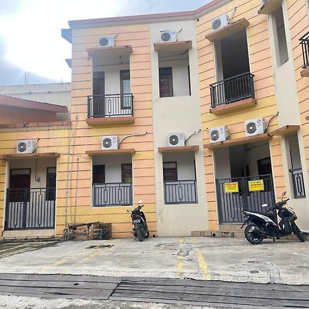 Oyo 93380 Penginapan Mangkoe Barokah Tanah Grogot Bagian luar foto